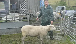  ?? 16_t29Lismore­02 ?? Jim MacCormick with his texel sheep, which was crowned overall sheep champion.