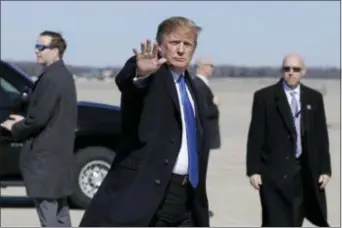  ?? EVAN VUCCI — THE ASSOCIATED PRESS ?? President Donald Trump walks to board Air Force One for a trip to Vietnam to meet with North Korean leader Kim Jong Un, Monday in Andrews Air Force Base, Md.