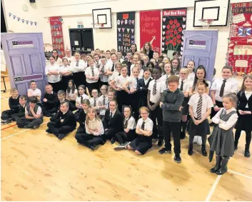  ??  ?? Inspiratio­nal Youngsters from Cairns and St Cadoc’s primaries have joined forces to stamp out prejudice