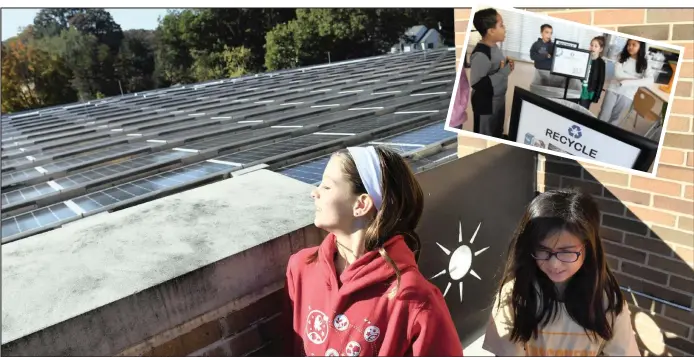  ?? PICTURES: WASHINGTON POST ?? MADDY Mangi, left, and Maya Umerov-Todoroki give a tour of an area with solar panels at Discovery Elementary School in Arlington, Vrginia. The girls are part of the Eco-Action Team at the school, which was designed and built to produce as much energy as it uses. That’s called ‘net zero’. Inset: Learners explain which bins in the school’s dining areas are for which kind of waste.