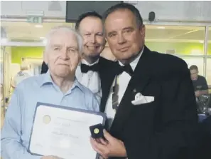  ?? ?? Jack Hood is presented with one of the Rotary Club’s highest accolades in 2015 by Chi Priory president Peter Haydn Jones