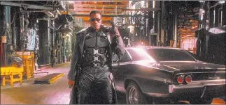  ??  ?? Wesley Snipes stars as a vampire hunter in “Blade.” New Line Cinema