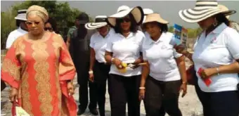  ??  ?? Some members of COFFHA taking Executive Vice Chairman of ENL Consortium / Special Guest of Honour, Princess (Dr) Vicky Haastrup, round during an inspection of the site for the Skill Acquisitio­n Centre in Okun-Ajah, Ajah, Lagos