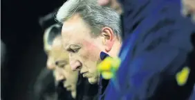  ?? MARK KERTON ?? Cardiff City manager Neil Warnock during the minute’s silence