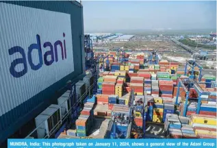  ?? ?? MUNDRA, India: This photograph taken on January 11, 2024, shows a general view of the Adani Group owned Mundra Port in Mundra. — AFP