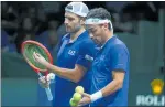 ?? PHOTO / AP at Wimbledon ?? Italy’s Simone Bolellli and Fabio Fognini in their Davis Cup win over US yesterday.