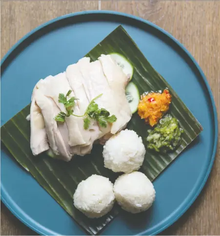  ?? DARREN CHUANG ?? Keep it local by pairing chef Justin Cheung's Hainanese chicken rice with a Pinot Noir from the Okanagan Valley.