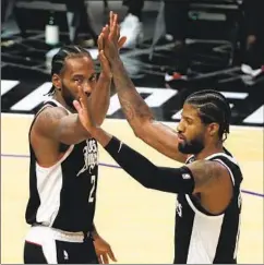  ?? Gina Ferazzi Los Angeles Times ?? KAWHI LEONARD (2) and Paul George proved to be the dynamic duo the Clippers hoped for, though Leonard’s injury derailed their postseason.