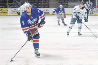  ?? COLIN MACLEAN/JOURNAL PIONEER ?? Summerside D. Alex MacDonald Ford Western Capitals forward Alex Hambly fires a shot on goal Tuesday at Eastlink Arena.