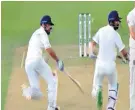  ??  ?? The captain wins the race to safety, and Pope duly runs out Pujara