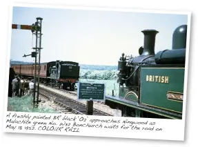  ??  ?? A freshly painted BR
Malachite black ‘O2’ approaches green No. W32 Ningwood as May 18 Bonchurch waits
1952. COLOUR RAIL for the road on