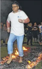  ?? Picture: Tony Flashman FM4237029 ?? Kentish Gazette editor Leo Whitlock during last year’s firewalk