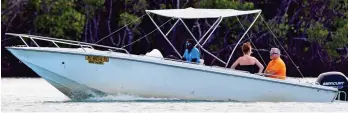  ??  ?? Making waves: The couple enjoy a boat ride during their Mauritius break