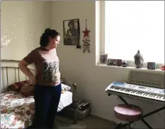  ?? Gina Ender/The Signal ?? Maia Koss stands in her bedroom in the Three Oaks apartment complex in Newhall on the day of its grand opening on Wednesday.