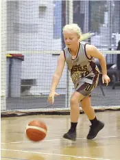  ?? ?? Devils Ruby Sharpe shows intense focus as she dribbles the ball.