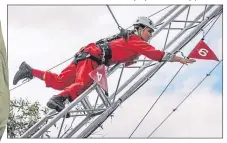  ??  ?? Sair Khan needed a head for heights as she got to grips with nerve-jangling The Edge challenge