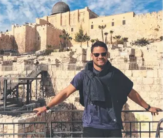  ??  ?? Jarryd Hayne in Jerusalem this month and (inset) arriving back in Tel Aviv yesterday.