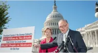  ?? — AP ?? Senator Elizabeth Warren and Senate Minority Leader Chuck Schumer hold a news conference to criticise the Republican tax and budget proposals at the Capitol in Washington.