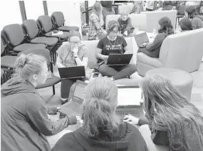  ?? MARCO SANTANA/ORLANDO SENTINEL ?? Lyla Lovett, top right, has been learning from Electronic Arts pros this week during a weeklong program meant to encourage more girls to get into the game industry.