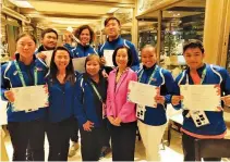  ?? PSC-POC MEDIA ?? MEMBERS OF THE PHILIPPINE YOG TEAM (from left to right) Golfer Yuka Saso, chef de mission Jonne Go, PSC executive director Merly Ibay, Philippine ambassador to Argentina Linglingay Lacanlale, archer Nicole Tagle and Jann Mari Nayre of table tennis. Standing behind them are golfer Carl Janno Corpus, kiteboarde­r Christian Tio and fencer Lawrence Tan.