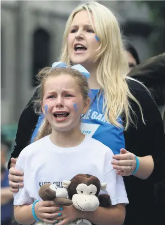  ?? Pictures / AP ?? Supporters were distraught when Charlie Gard’s parents announced they were ending their legal fight.