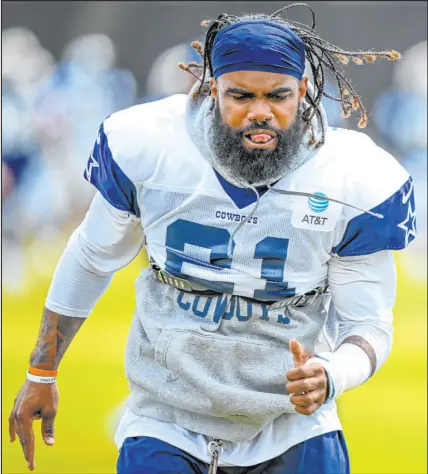  ?? Gus Ruelas
The Associated Press ?? Dallas running back Ezekiel Elliott has faced criticism after having the lowest per-carry average of his career (4.0 yards) in 2020, followed by his worst per-game average (59 yards) last season.