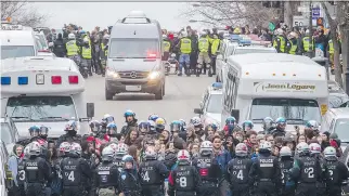  ?? DARIO AYALA/MONTREAL GAZETTE FILES ?? Student protesters are kettled by police on St-Denis St. in April. More than 1,000 arrests were made at demonstrat­ions during this past spring.