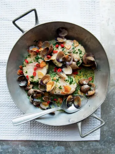  ??  ?? HAKE STEAKS IN GREEN SAUCE WITH CLAMS Simple Spanish-style favourite with a chilli kick. F&T WINE MATCH
Clean and crisp citrus palate with fennel notes (eg 2015 Brezo godello, Grégory Pérez, Bierzo, Spain)
RECIPES START ON PAGE 119