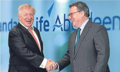  ??  ?? DOING WELL: Keith Skeoch and Martin Gilbert, co-chief executives of Standard Life Aberdeen