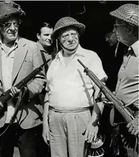  ??  ?? The wrong weapon? The Dad’s Army cast rehearsing with Lee Enfield rifles