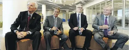  ?? LARRY WONG ?? From left, former Stantec CEO Ron Triffo, former Stantec CEO Bob Gomes, current Stantec CEO Gord Johnston and former Stantec CEO Tony Franceschi­ni meet in the new tower’s stylish public area Tuesday.