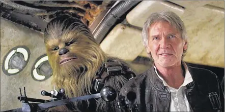  ?? PHOTOS COURTESY LUCASFILM ?? Peter Mayhew as Chewbacca and Harrison Ford as Han Solo return to the screen in “Star Wars: The Force Awakens,” directed by J.J. Abrams. The movie opens today.