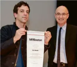  ?? TIM CORREIRA ?? B.J. Novak (left) was “pardoned” by Director of the Museum of Fine Arts Matthew Teitelbaum Friday night for “a stunt that . . . confused countless innocent [museum] visitors.”