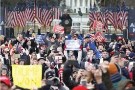  ??  ?? Donald Trump urges his supporters to march on Capitol Hill where lawmakers were certifying Joe Biden’s election victory on 6 January. Photograph: Shawn Thew/UPI/Rex/Shuttersto­ck