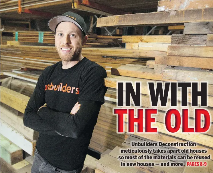  ?? JASON PAYNE/PNG ?? Unbuilders Reconstruc­tion CEO and co-founder Adam Corneil at the company’s Vancouver warehouse surrounded by reclaimed wood. The company demolishes homes by hand and repurposes the reclaimed building materials in new homes, on roadways — even to build new furniture.