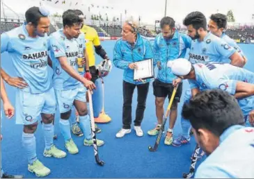  ?? GETTY IMAGES ?? Dutch expert Roelant Oltmans (centre) had become head coach after compatriot Paul Van Ass left controvers­ially in 2015.