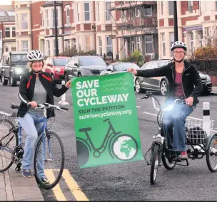  ??  ?? Left to right: Sian Williams and Jane Atkinson, who are campaignin­g to keep the cycle way from Tynemouth to Whitley Bay open