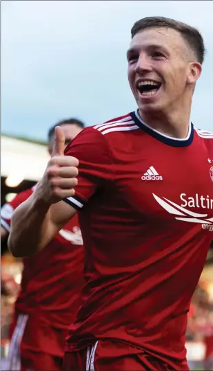  ?? ?? Aberdeen midfielder Lewis Ferguson celebrates after scoring his headed