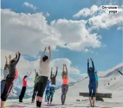  ??  ?? On-snow yoga