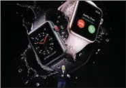  ??  ?? Cook shows new Apple Watch Series 3 at the Apple showcase