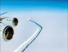  ?? JOHN SONNTAG/NASA 2016 ?? Scientists had been monitoring the Antarctic ice shelf, above, that yielded an iceberg that dwarfs New York City. They watched as a crack grew more than 120 miles long.