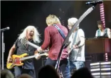  ??  ?? REO Speedwagon members perform at center stage.