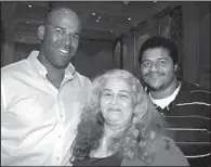  ??  ?? Louise Mason with sons David and Maceo Mason