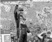  ?? BRIAN LAWDERMILK/GETTY IMAGES ?? Martin Truex Jr. rejoices in victory lane after backing up his regular-season dominance with his 5th win in 2017.