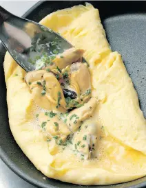  ??  ?? ‘It’s worth lobster. It’s worth caviar.’ Roux says of his Mussel & Chive Omelette.