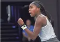  ??  ?? The United States’ Coco Gauff reacts during her third-round match against Japan’s Naomi Osaka on Friday at the Australian Open in Melbourne. Gauff won 6-3, 6-4.