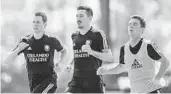  ?? JACOB LANGSTON/STAFF PHOTOGRAPH­ER ?? Sacha Kljestan, center, is set to make his debut with Orlando City this week after serving a two-game suspension.