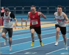  ??  ?? Karl Carton (142) dips to win the Leinster Masters 60m title.