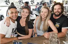  ??  ?? Enjoying German beer during Oktoberfes­t celebratio­ns are (from left) Jordan Bartholome­w and Charley Knowles and Emily and Doug Gale.