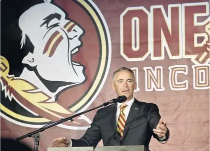  ?? PHIL SEARS/AP ?? FSU football coach Mike Norvell speaks at his introducto­ry news conference Sunday in Tallahasse­e. Norvell left Memphis to replace fired coach Willie Taggart.